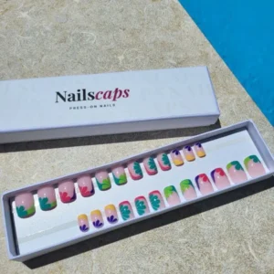 Faux ongles press-on floraux colorés avec motifs de fleurs et feuillages sur base nude en forme carrée