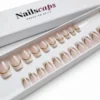 Faux ongles French dorée Golden Line avec base nude rosé translucide