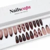 Faux ongles amande nude avec French marron chocolat